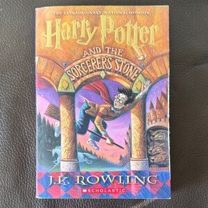 "Harry Potter and the Sorcerer's Stone" by J.K. Rowling Paperback Novel